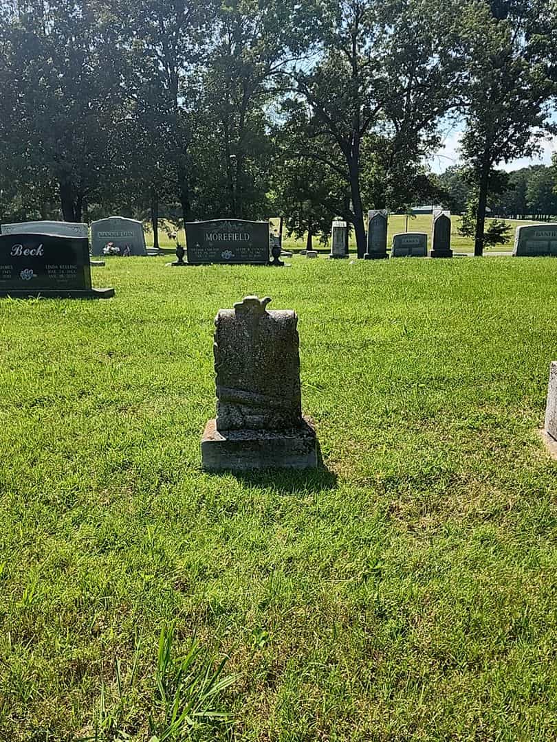 Coy Bennett Faith's grave. Photo 2