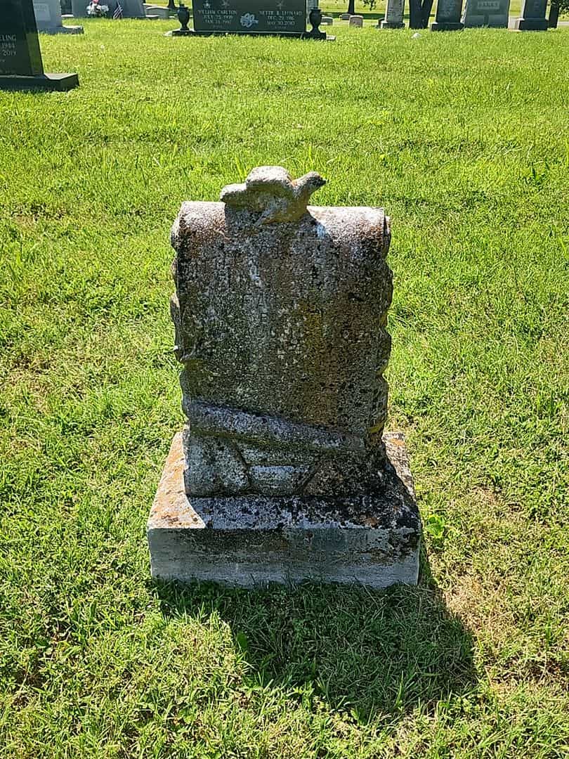 Coy Bennett Faith's grave. Photo 1